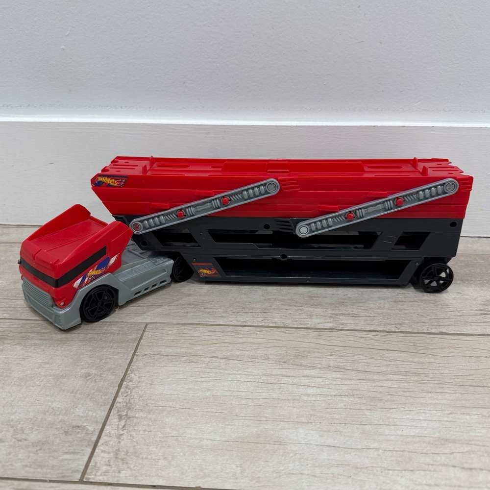 Hot Wheels Toy Truck Track Set, HW Mega Hauler Playset, Stores 50+ cars